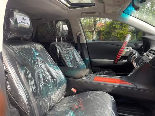 A picture of registered make lexus model rx350 condition ac chilling engine gear