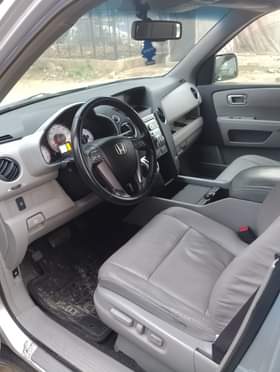A picture of 2009 Honda pilot tokumbo accident free Price 9 2m Location