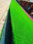A picture of Artificial green grass carpets available in all sizes 0754140493