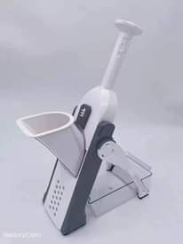 A picture of Manual Vegetable Cutter 5 In 1 Food Chopper Message Saadia