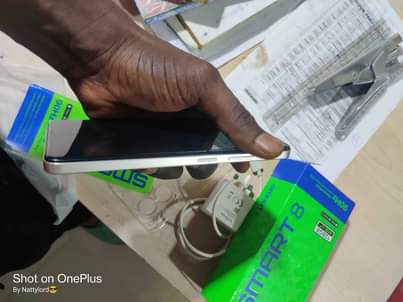A picture of Inifinix smart 8 with full accessories no single fault selling