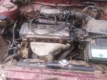 A picture of Old model Toyota Corolla nothing to fix very cool engine