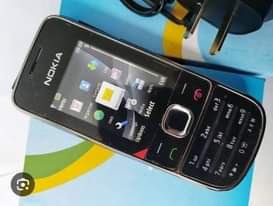 A picture of nokia 2700 mpyaa pamoja na betri na chaji.. 0782605797