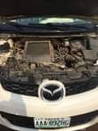 A picture of year used Mazda CX 7 2009 model in contact with
