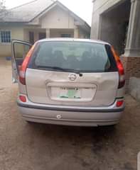 A picture of Nissan Almera Tino First body Engine very sound Gear working
