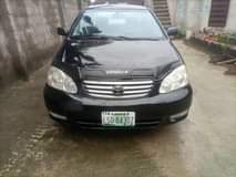 A picture of TOYOTA COROLLA 2004 4 PLUGS Engine Gear Ac is CHILLING