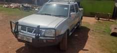 A picture of NISSAN hardbody model 2004 4wd diesel manual with turbo on