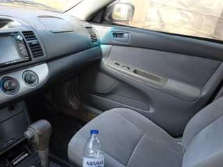 A picture of Toyota Camry 2004 4 plug Painted Engine and gear are