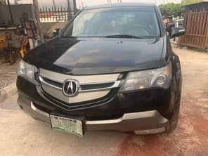 A picture of FRESH Neatly used 2008 Model Acura MDX Absolutely nothing to
