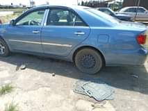 A picture of Toyota Camry 2004 model with chilling AC Eket 2 2m