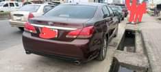A picture of 2011 Toyota avalon Belgium standard Silent engine Ac chilling Perfect
