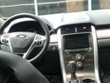 A picture of Registered 2014 Ford Edge SE AWD Thumbstart Infotainment screen leather