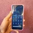 A picture of samsung A13 0655695769 64gb ram 4 BEI 230 000 Finger