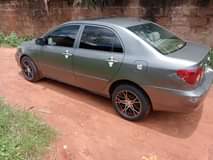 A picture of Neatly used Toyota corrola Buy And Drive First body Everything