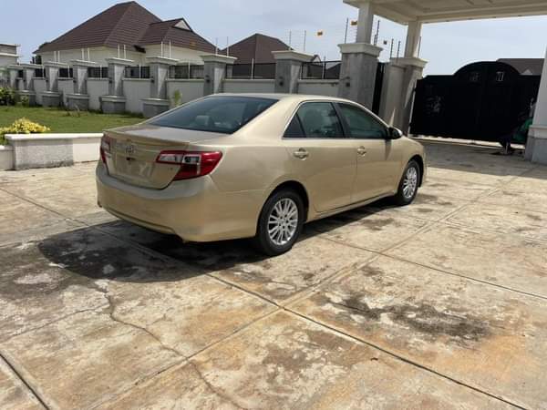A picture of 2012 TOYOTA CAMRY LE KEYLESS FIRST BODY WITH DUTY AT