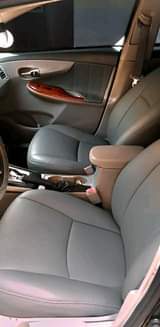A picture of Pure Belgium grade American Spec 2010 Toyota Corolla in good