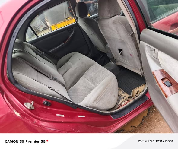 A picture of 06 corolla Only body needed attention ac gear engin ok