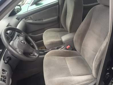 A picture of Toyota Corolla 09161519383 Automatic Wheel covers Fabric interior Keyless entry