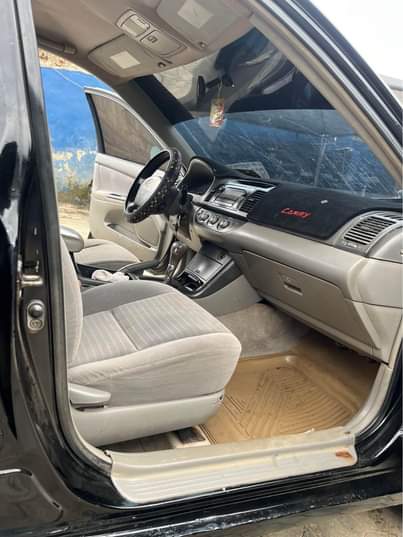 A picture of Toyota Camry direct 2006 model note bad painting