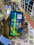 A picture of iPhone X 280k with a camera issue and lines in
