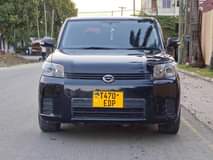 A picture of TOYOTA RUMION Mwaka 2010 Cc 1490 Klmtr 74elf Bkack metalic
