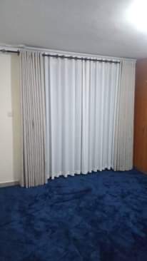 A picture of Curtains nets blinds rods and all interiors