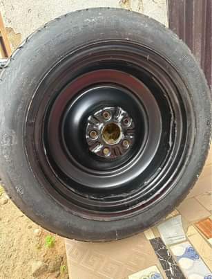 A picture of Brand new Bridgestone Size 17 18 Wheel Factory Donut Spare