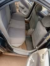 A picture of PARTIALLY FIRST BODY NIGERIA USED TOYOTA COROLLA WITH good engine