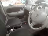 A picture of 18 toyota sienta model 2008 9 price tag.. 26.5m ugx
