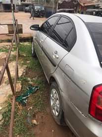A picture of Hyundai accent complete first body engine gear perfect. Ac not