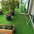 A picture of Wall wall woolen and Artficial turf grass carpets for offices.homes.balconies