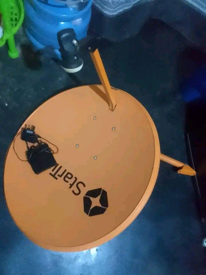 A picture of Startimes decoder and dish full set