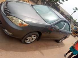 A picture of REGISTERED 2003 TOYOTA CAMRY WHAT TO FIX NOTHING PAINTED ENGINE