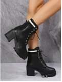 A picture of Womens boot white brown and black leather