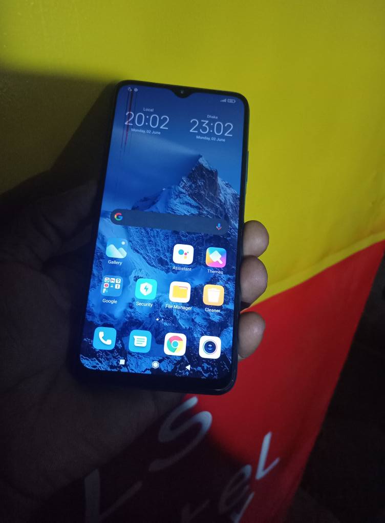 A picture of Redmi 9power 64gb 4gbram 6000Mah battery.has dent in the screen