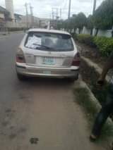A picture of Mazda 323f automatic transmission everything perfect location Ibadan price 700