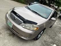 A picture of 2004 Toyota Corolla Baked on first body Super clean in