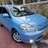 A picture of TOYOTA RAUM MODEL 2003 DUW Niliagiza mwenyewe na Kilometa 47k