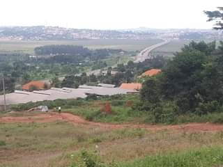 A picture of Sisa estate on sale with titles along hoima road Call