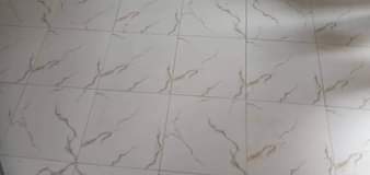 A picture of Flour tiles 12 pieces in abox 2 will have slight