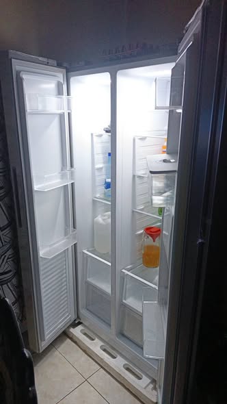 A picture of 65 skyworth Tv and 560 litres dispenser fridge