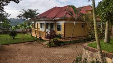 A picture of LOVE HOME HOUSE FOR SALE IN MATUGGA TOWN NAIRA TARMAC