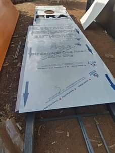 A picture of Road sign posts and printing