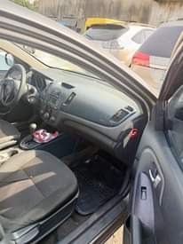 A picture of Kia cerato engine idea working perfect AC working buy and
