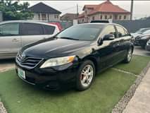 A picture of Clean REGISTERED camry 2010 Neatly used First body Black colour