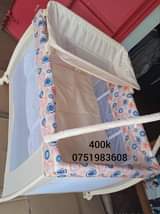 A picture of Uk foldable cot bed