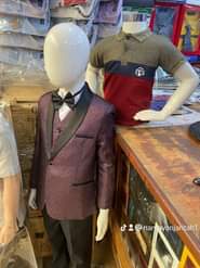A picture of Boys children suits in different colors and designs Trouser white