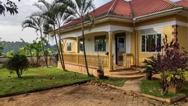 A picture of LOVE HOME HOUSE FOR SALE IN MATUGGA TOWN NAIRA TARMAC