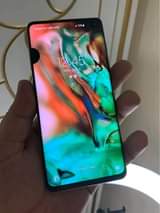 A picture of Samsung galaxy s10 plus with dot
