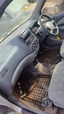 A picture of 2002 Raum Toyota White